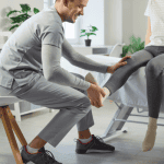 Rehabilitation after injury, leg massage for female patient